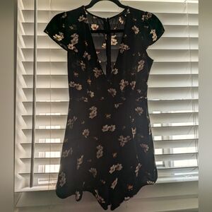 Black romper with flowers